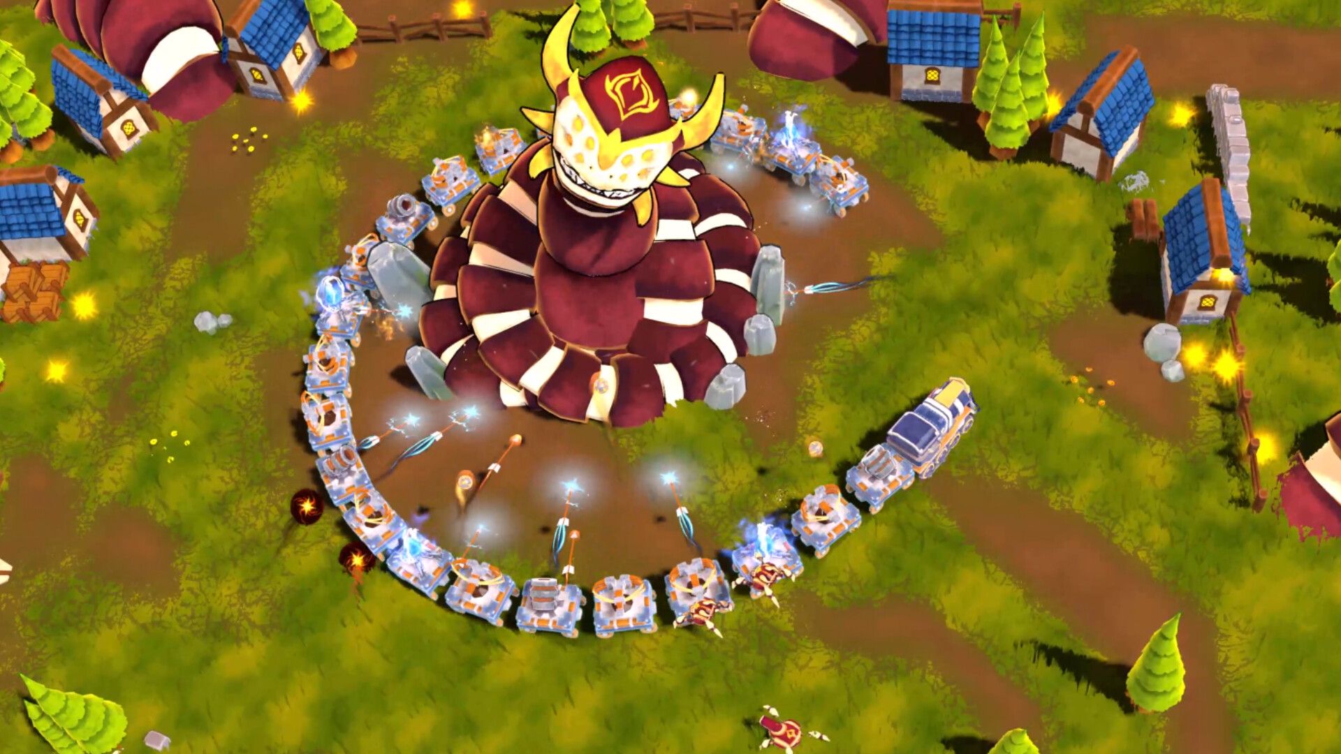 Seen from above, the long war train coils around a giant masked creature in a village clearing.