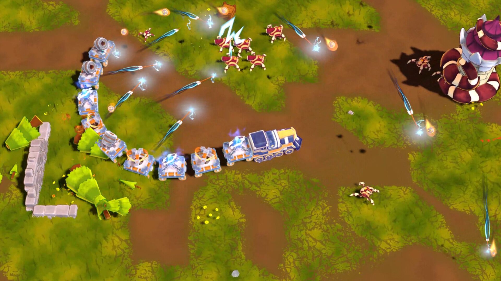 The train curves across a field, firing lightning and bolts at demons approaching from the right.