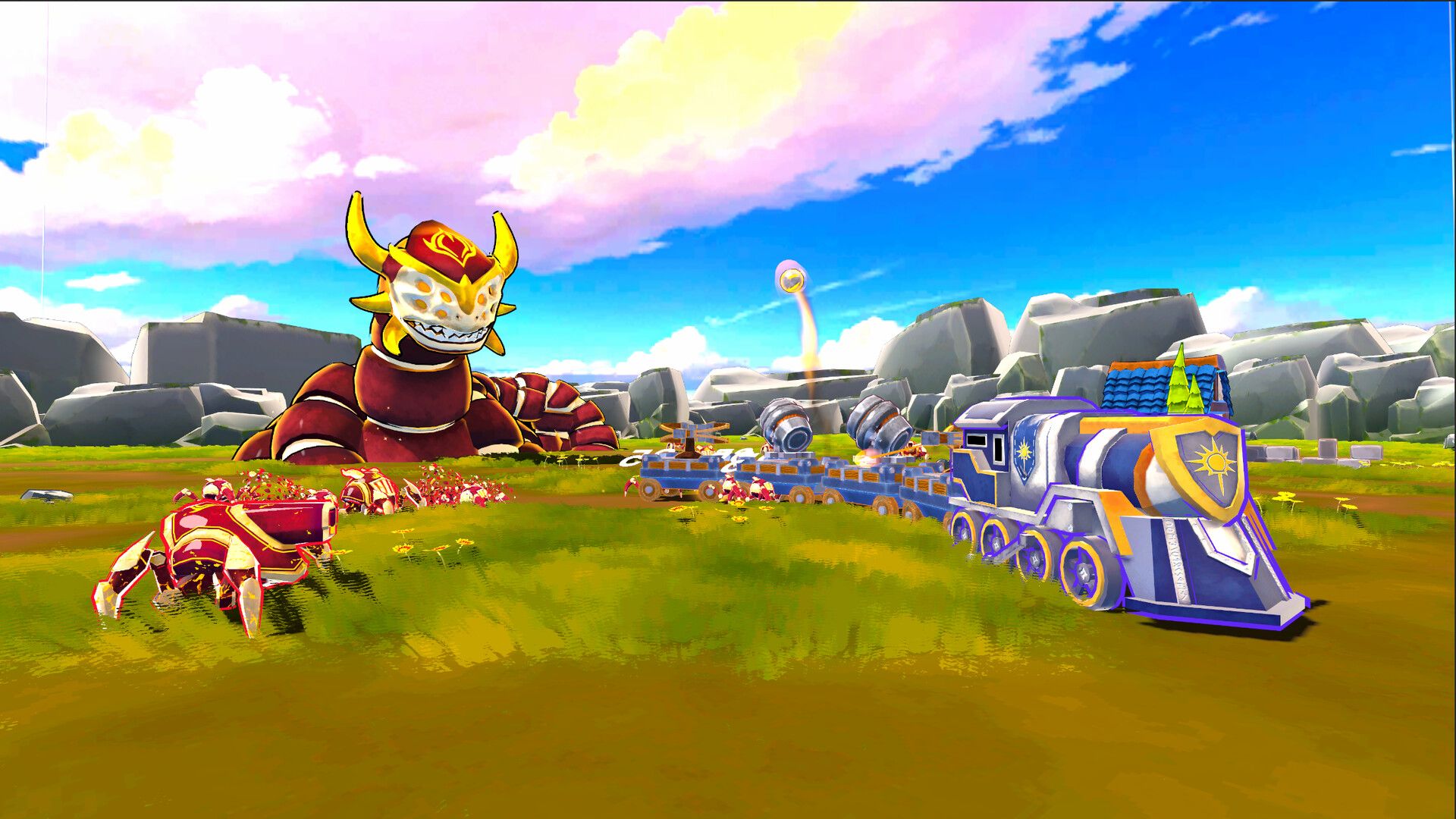 A cute blue-and-gold war train rolls across a sunny green valley. Behind it, a giant grinning demon and a pack of red crab-like demons are closing in.